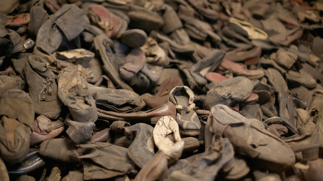 The exhibition at the camp houses thousands of children's shoes that were taken from prisoners