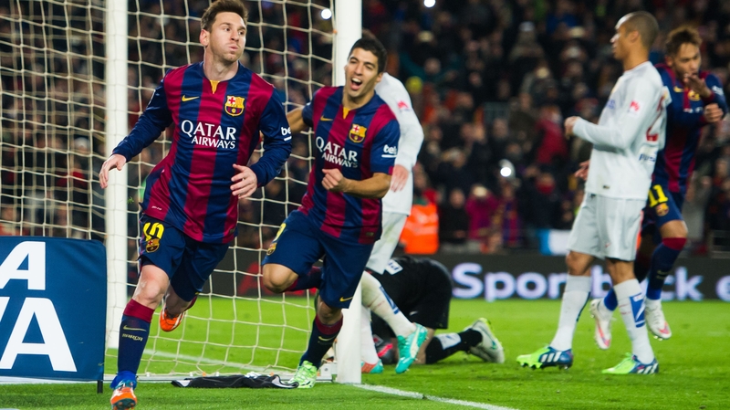 Lionel Messi celebrates after scoring against Atletico Madrid