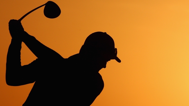 Justin Rose of England warms up prior to teeing off in the second round of the Abu Dhabi Golf Championship