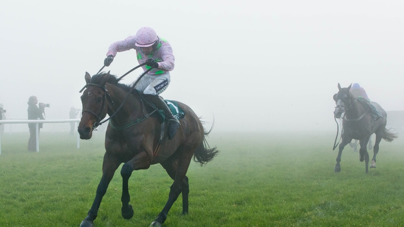 Ruby Walsh on Djakadam pull clear to in the Gowran mist to win the feature event