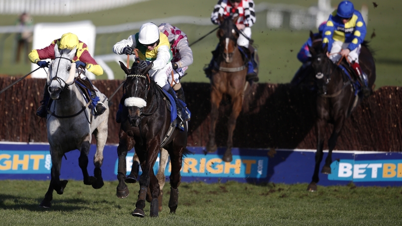 Leighton Aspell riding Many Clouds (white cap) clear the last to win