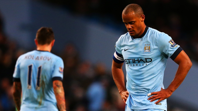 Manchester City captain Vincent Kompany shows his dejection