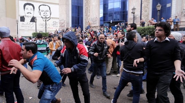 Police fired shotguns and tear gas to disperse hundreds of protesters in central Cairo