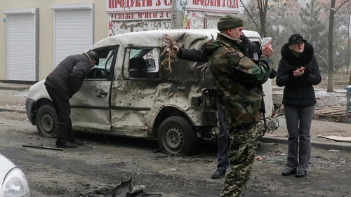 A van damaged by shelling in the eastern Ukrainian city of Mariupol
