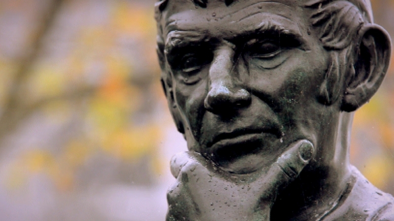 Poet Michael Hartnett (1941-1999), as depicted in a commemorative statue in Newcastlewest, Co Limerick where he grew up