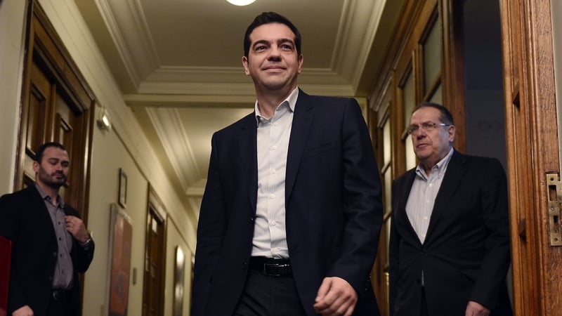 Alexis Tsipras arrives for the inaugural meeting of his cabinet in Athens this morning