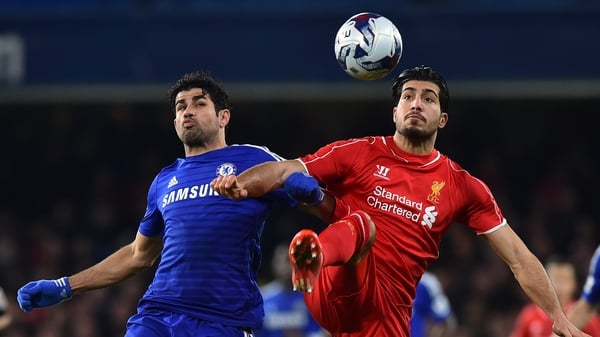 Diego Costa (L) has been charged over an incident involving Emre Can (R) rather than another involving Martin Skrtel