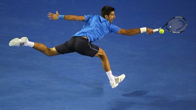 Novak Djokovic lunges for a ball in his encounter against Gilles Muller at the Australian Open in Melbourne