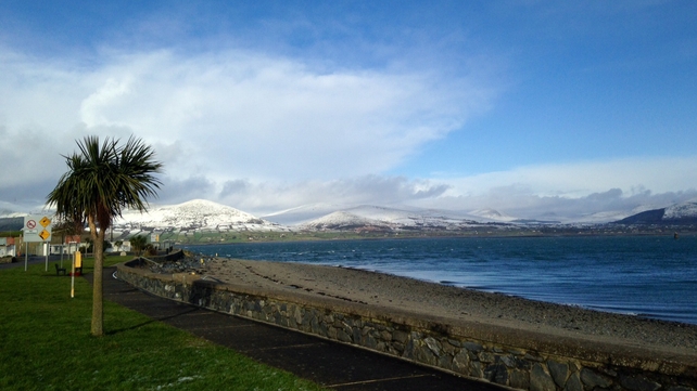 Snow on the mountains of Mourne seen from sunny Greenore (Pic: Pádraig Hanratty)