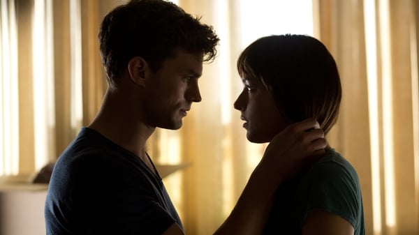 Jamie Dornan and Dakota Johnson as Christian Grey and Anastasia Steele