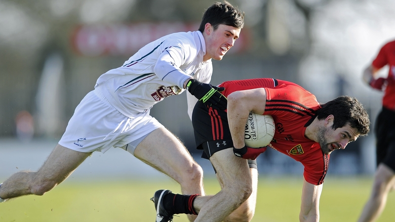 Down’s Kevin McKernan with Mick O'Grady of Kildare