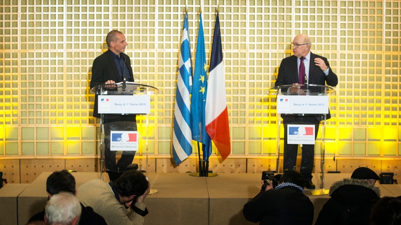 Greek Finance Minister Yanis Varoufakis (L) met with his French counterpart Michel Sapin (R)