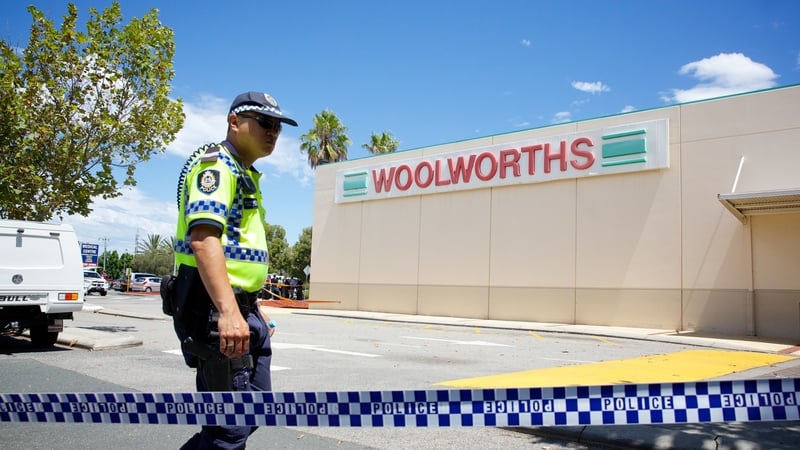 Police and firefighters at the scene of an explosion at the Galleria Shopping Centre in Morley, Perth