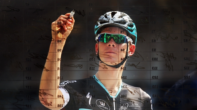 Julian Vermote of Belgium and Etixx - Quick-Step signs on at the start during stage one of the Dubai Tour on Wednesday