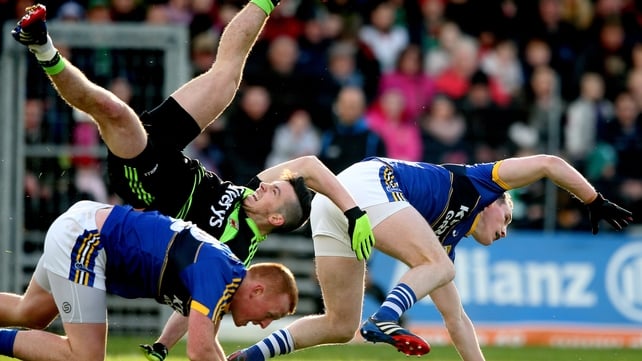 Mayo’s Evan Regan collides with Mark Griffin and Johnny Buckley of Kerry during their Allianz League game on Sunday