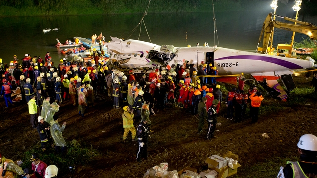 The wreckage is hoisted with cranes