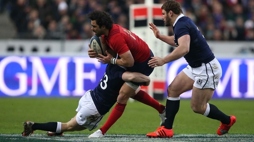 France's Yoann Huget is tackled