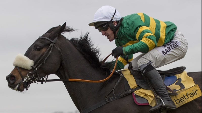 Tony McCoy broke the news of his impending retirement after partnering the nosebanded Mr Mole to victory in the Betfair Price Rush Chase