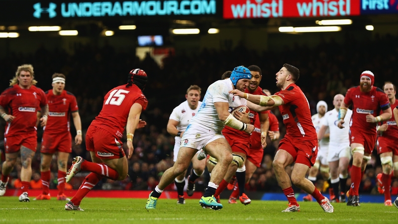 James Haskell of England takes on Alex Cuthbert of Wales