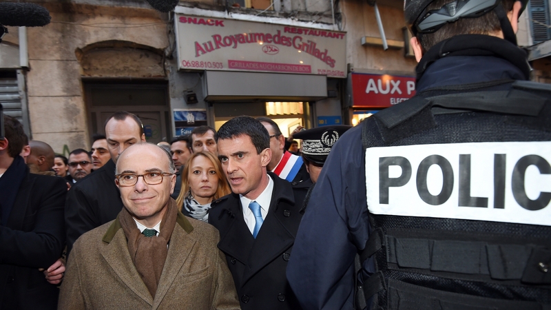 French Prime Minister Manuel Valls (C) with Interior Minister Bernard Cazeneuve (L) in Marseille today