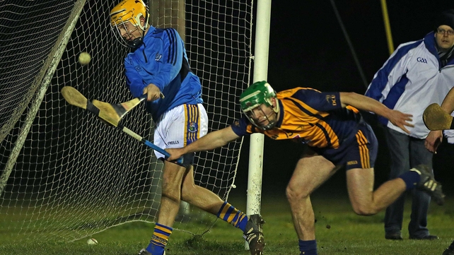 DCU's Cathal Curran with Jack Higgins of St Patricks-Mater Dei during the sides' Fitzgibbon Cup match