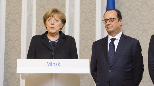 Angela Merkel and Francois Hollande speak to the media in Minsk before heading to Brussels for summit
