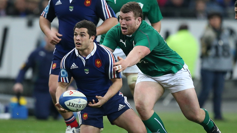Jack McGrath (R) tries to get to grips with Brice Dulin in last year's win over France in Paris