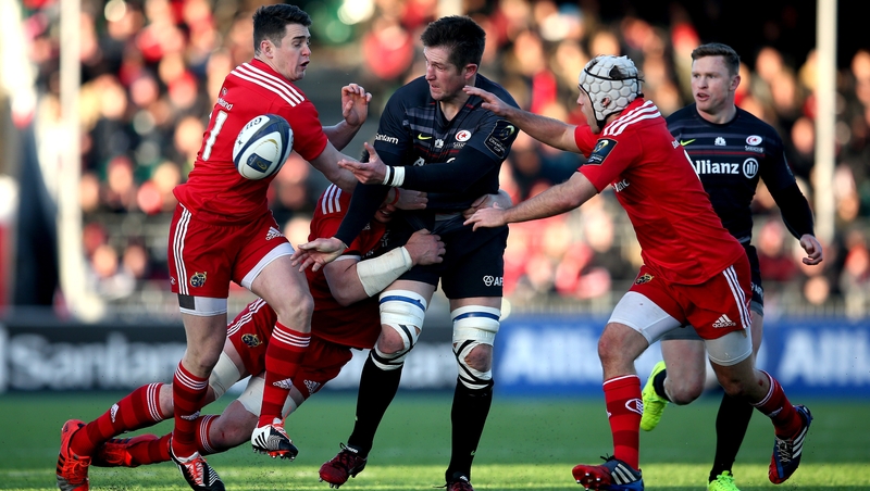 Ronan O'Mahony, Dave Foley and Duncan Williams tackle Ernst Joubert of Saracens