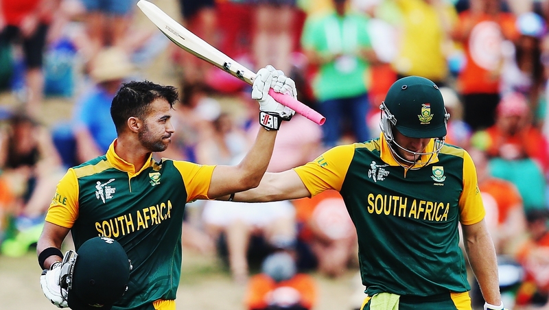 JP Duminy (left) celebrates his century