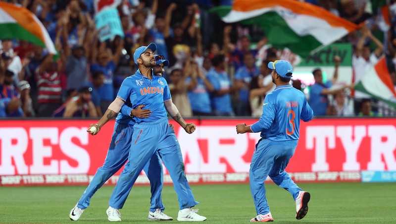 Virat Kohli of India celebrates after taking a catch to dismiss Pakistan's Shahid Afridi