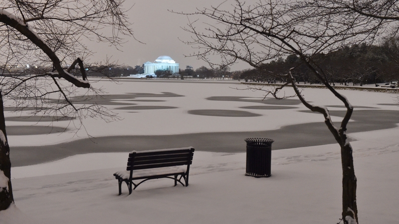 Snow covers the Tidal Basin in front of Jefferson Memorial in Washington DC