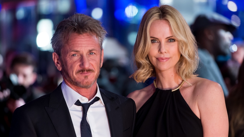 Penn and partner Charlize Theron at the premiere