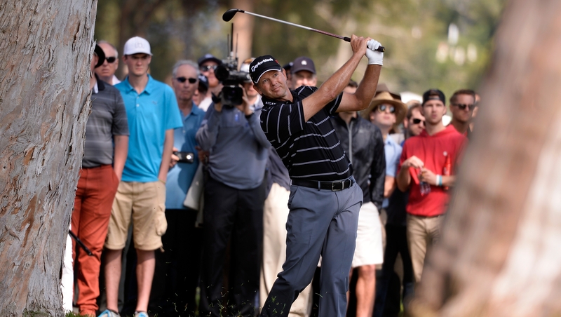 Retief Goosen's birdie finsih on 16 and 17 sees him two clear of the field