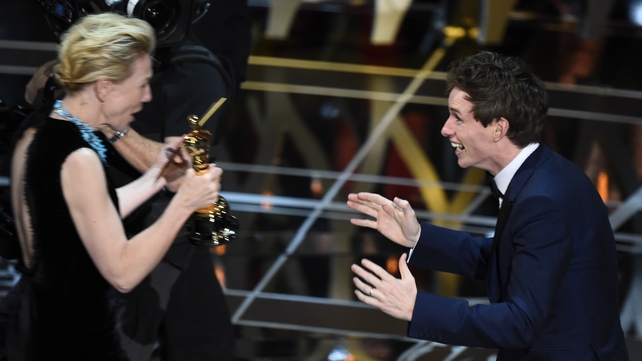 Eddie Redmayne receives the best actor award from Cate Blanchett