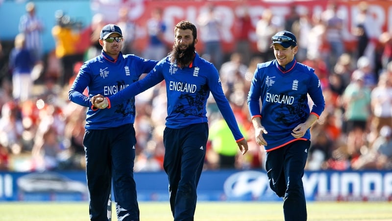 Moeen Ali of England (c) celebrates with team mates after dismissing Kyle Coetzer of Scotland