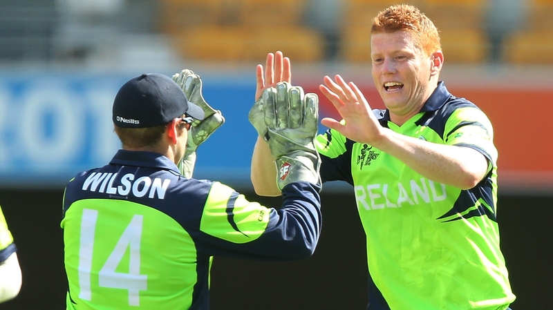 Kevin O'Brien celebrates a wicket with wicket keeper Gary Wilson during today's nail-biting win over UAE