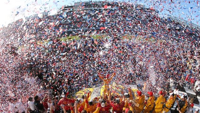 Joey Logano of Shell Pennzoil Ford celebrates in victory lane after winning the NASCAR Sprint Cup Series 57th Annual Daytona 500 at Daytona International Speedway, Florida