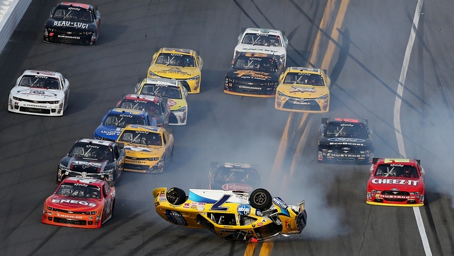 Nascar driver Regan Smith flips over during an on-track incident at Daytona International Speedway, Florida