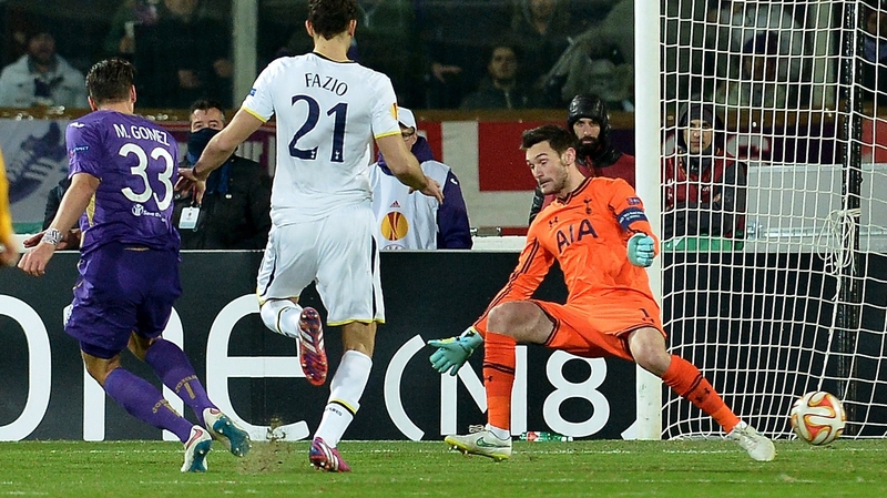 Mario Gomez (L) scores Fiorentina's first goal against Tottenham