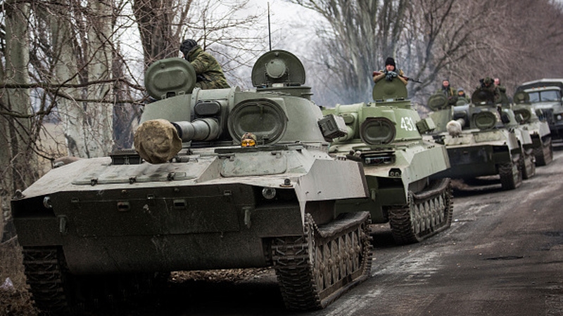 Pro-Russian rebels allegedly move tanks and heavy weaponry away from the front line of fighting