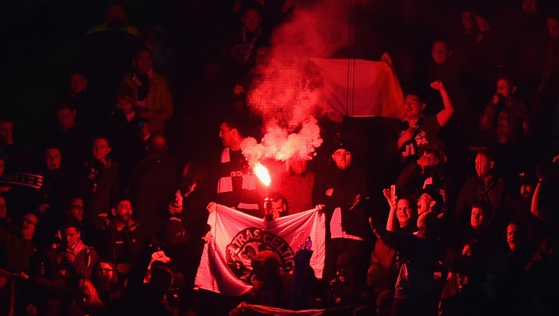 Celtic fans light a flare last night