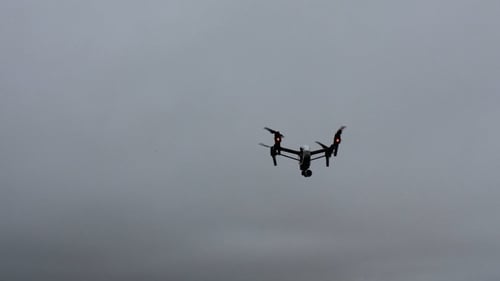 In a search of the suspects' vehicle officers found a quadracopter, as well as a handgun