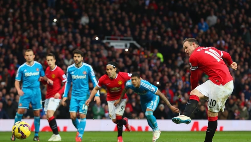 Wayne Rooney converts from the penalty spot
