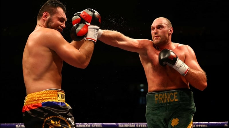 Christian Hammer recoils after Tyson Fury delivers a shuddering straight right at the O2