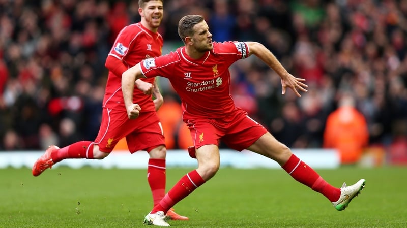 Jordan Henderson celebrates after scoring the opening goal against Man City