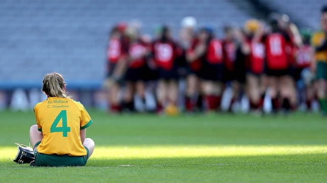 Ciara Donohue of Mullagh dejected at the end the game as Oulart-The Ballagh celebrates in the Camogie Senior Club Championship final on Sunday