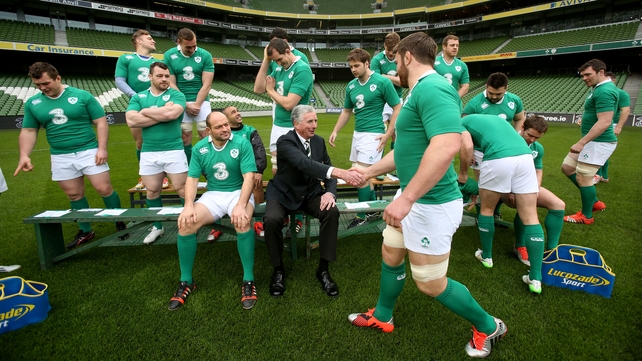 The Ireland team get ready for the team picture as Sean O'Brien greets IRFU president Louis Magee during the captain's run on Saturday