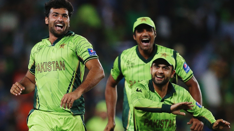 Sohail Khan of Pakistan celebrates with Rahat Ali and Ahmad Shahzad of Pakistan after dismissing South Africa's AB de Villiers