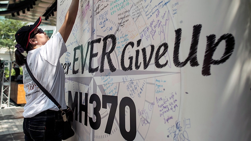 The families say they will begin fundraising if Australia, Malaysia, and China do not resume the search