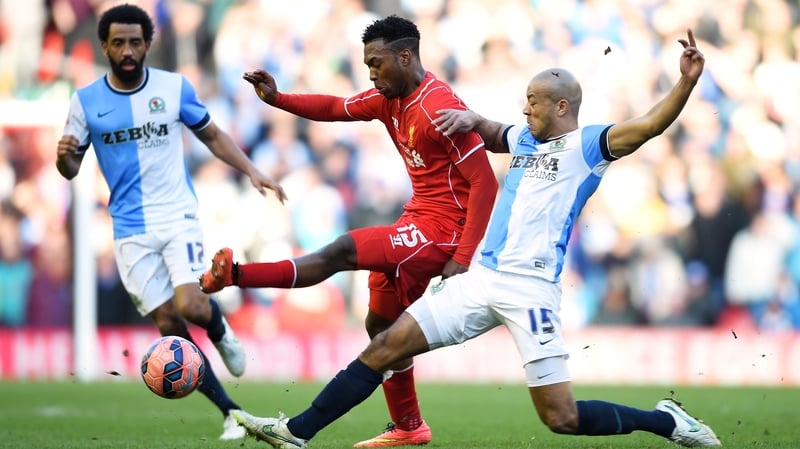 Daniel Sturridge of Liverpool is tackled by Alex Baptiste of Blackburn
